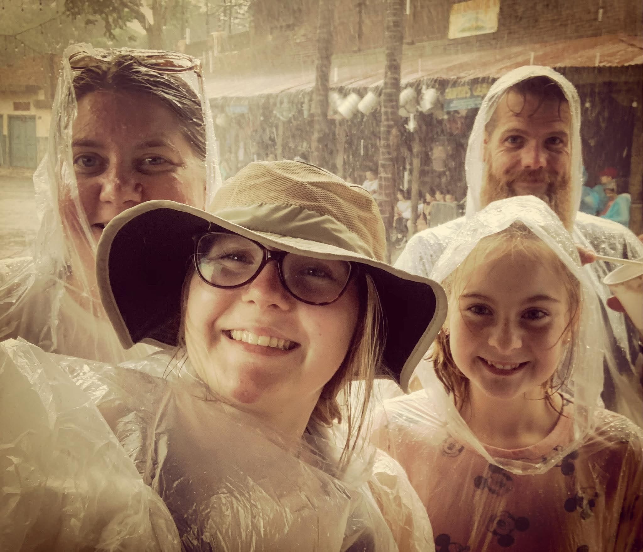 Heather's family having fun in the rain on vacation